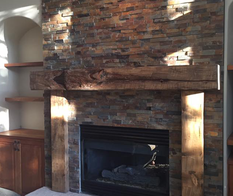 Stone Fireplace with Wood Mantle